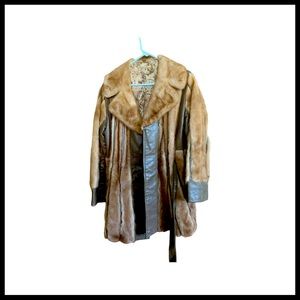 Unique fur and leather jacket. No brand or tags. Purchased in Norway in the 70s.